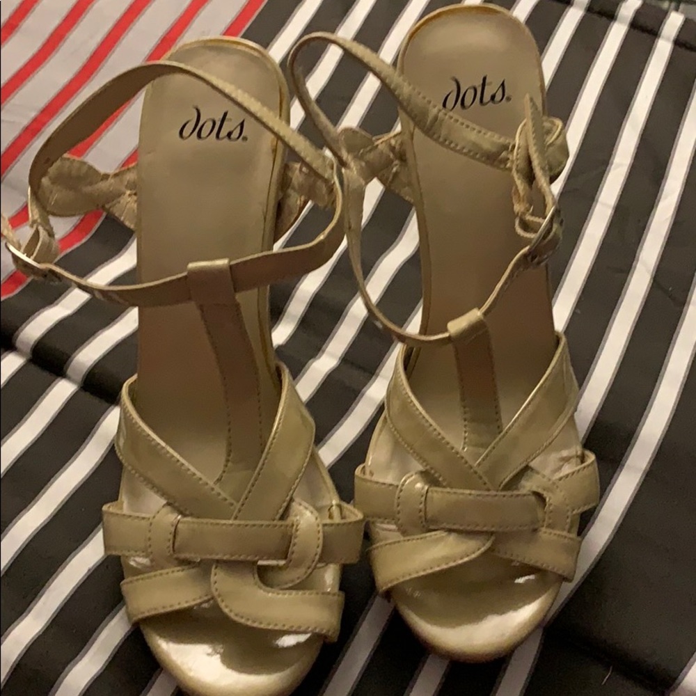 Beige 4” platform heels. Worn twice, size 8